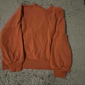 orange crewneck